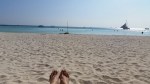 sunbathing on Boracay White Beach